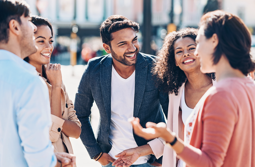 Group of 5 friends talking and laughing