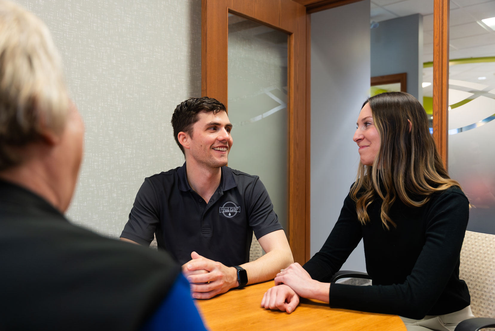 Libro Owners talking with a Libro Coach in a branch
