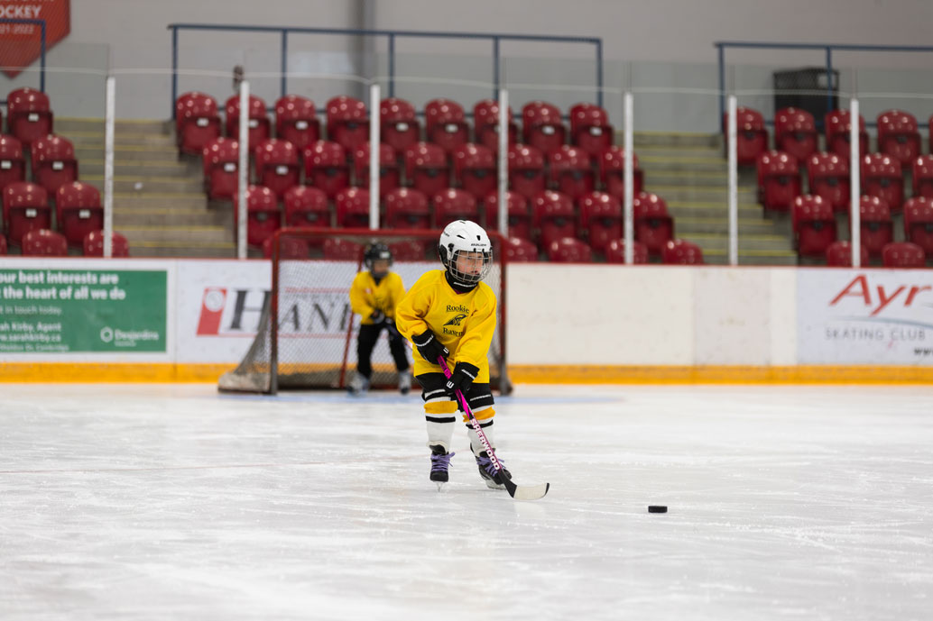 Child playing hockey