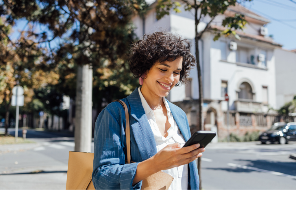 Woman on the go with her phone