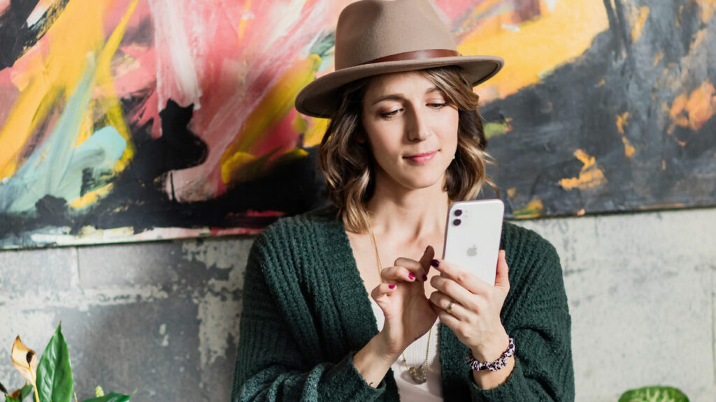 Libro Owner Danielle looking at mobile phone