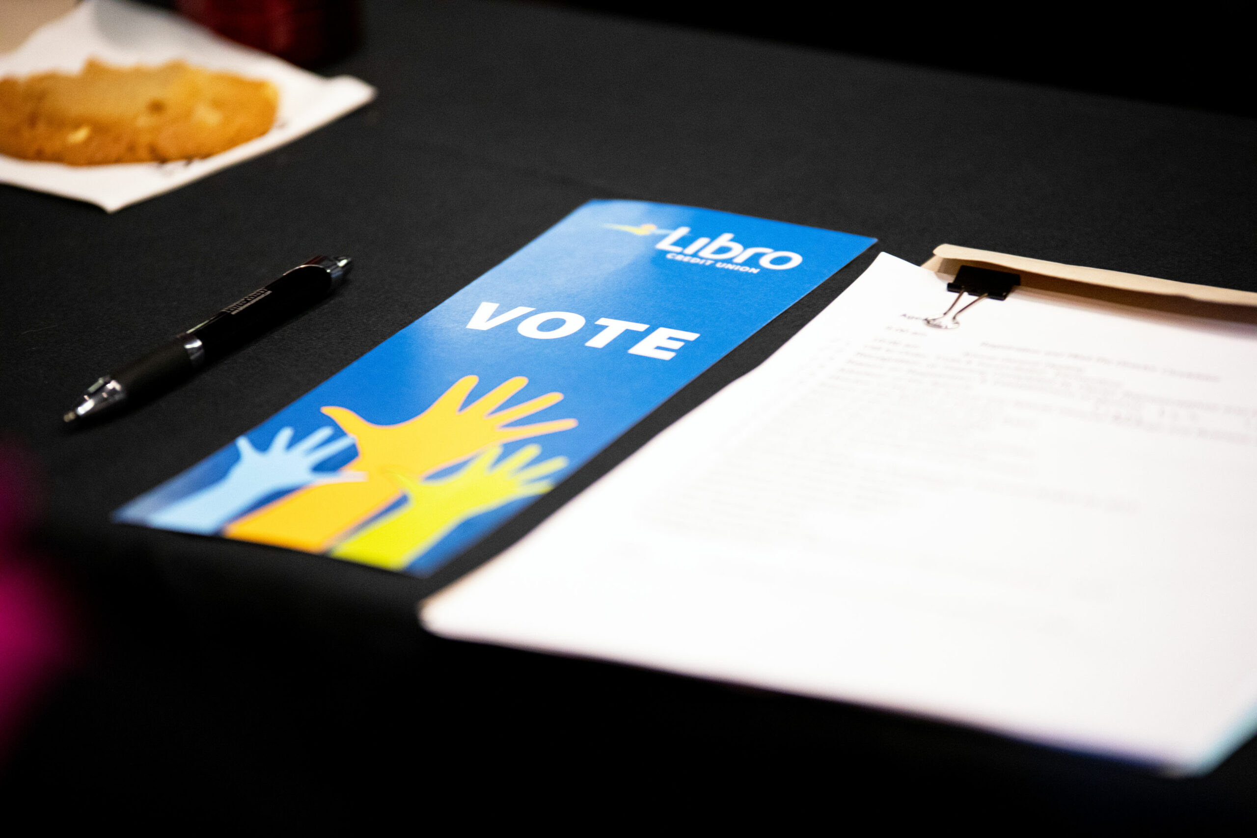 A Libro voting card sitting on a table