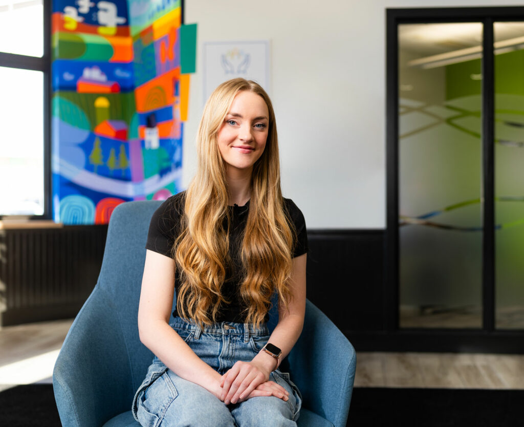 Libro Owner, Kadence, sitting in a Libro branch